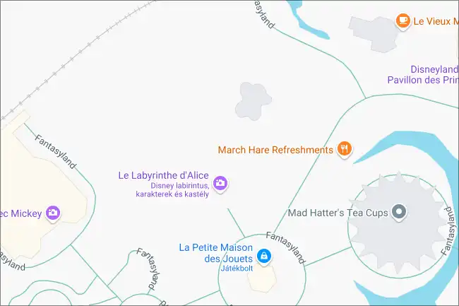A screenshot of how Alice's Curious Labyrinth looks on Google Maps. A white void with just a few pins indicating the location of the labyrinth and some nearby cafés and shops.